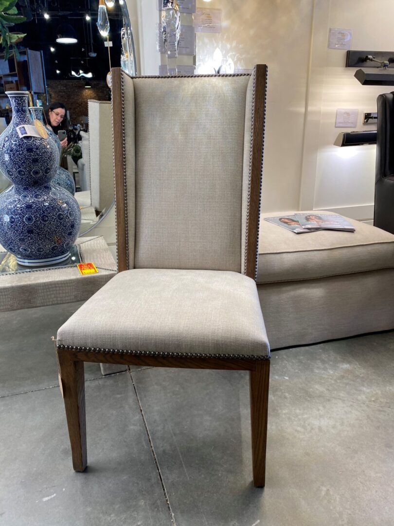 A chair with a white fabric on its back.